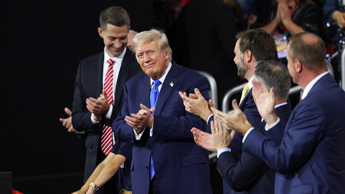 Donald Trump and JD Vance applaud at the RNC
