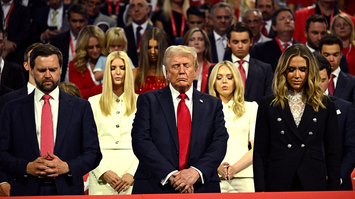 Senator JD Vance, a Republican from Ohio, from left, former US President Donald Trump, and Lara Trump, co-chair of the Republican National Committee, during the Republican National Convention