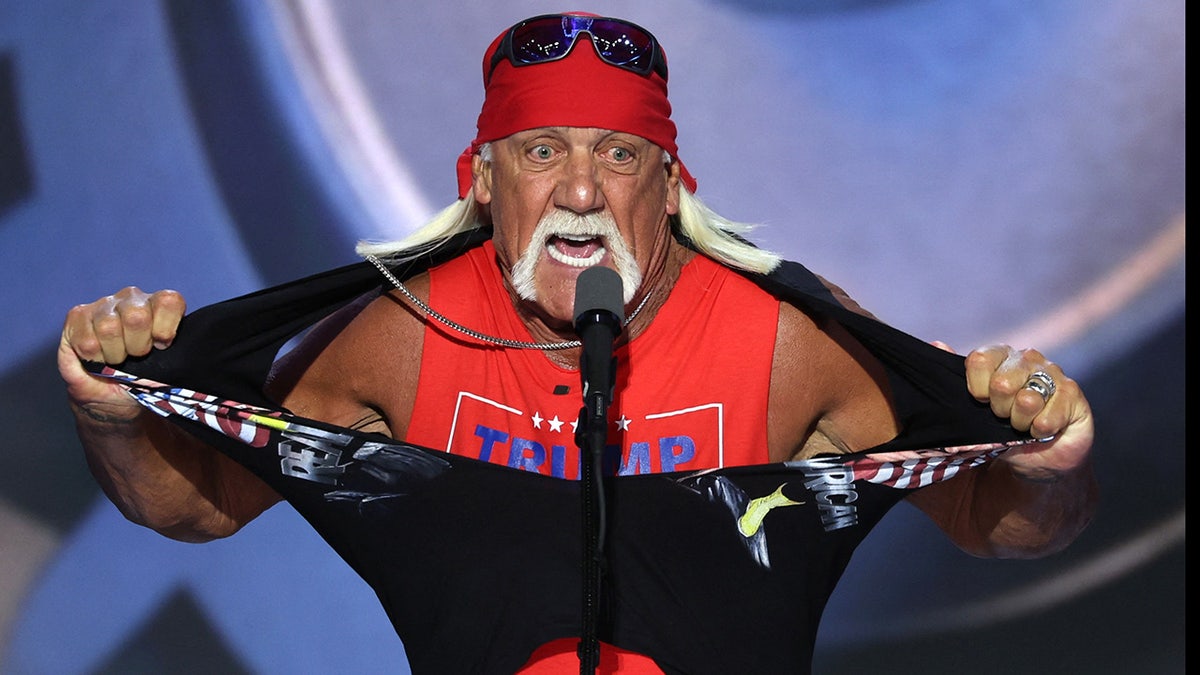 Hulk Hogan, professional entertainer and wrestler, tears his shirt open as he speaks on Day 4 of the Republican National Convention