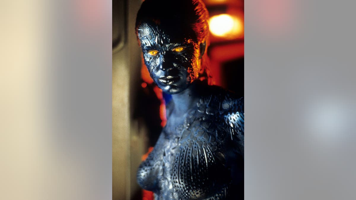 Rebecca Romijn in character as Mystique from X-Men