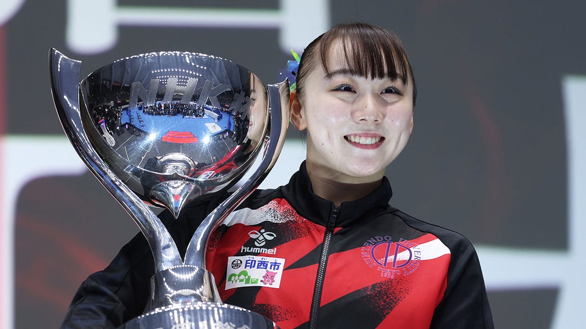 Shoko Miyata holds the trophy