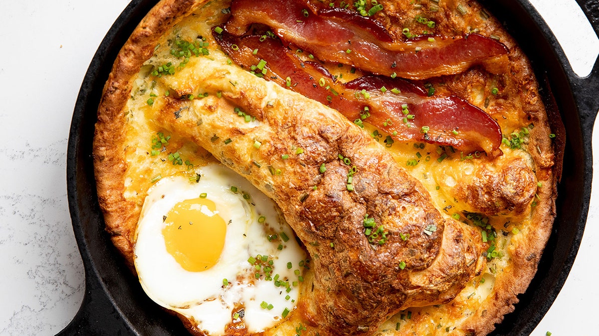 Smoked-Cheddar-Dutch-Baby-with-Maple-Bacon-and-Fried-Eggs