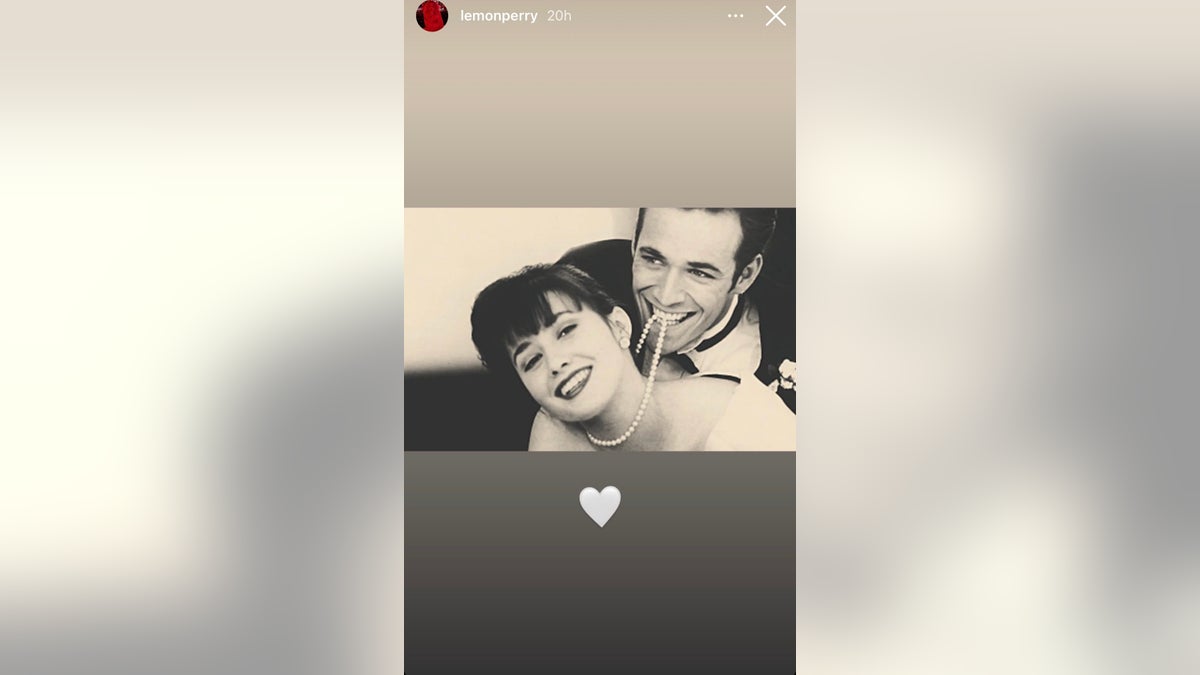 Black and white photo of Shannen Doherty and Luke Perry from Beverly Hills 90210