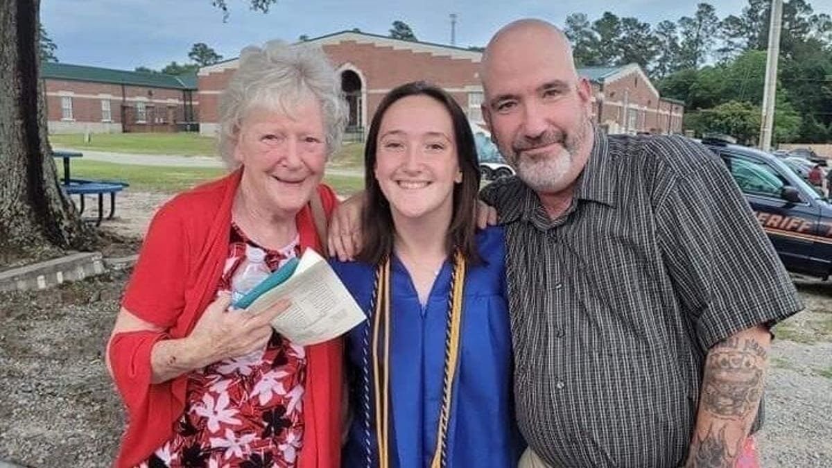 Steven Hughes with his mother and daughter.