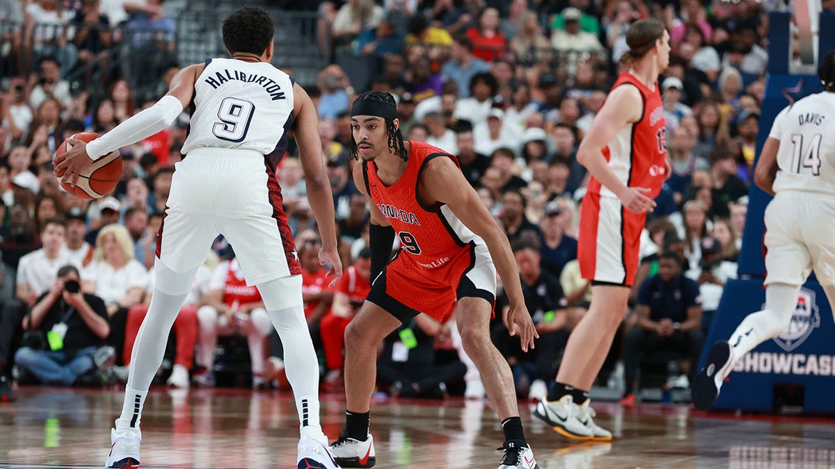 Tyrese Haliburton dribbles the ball