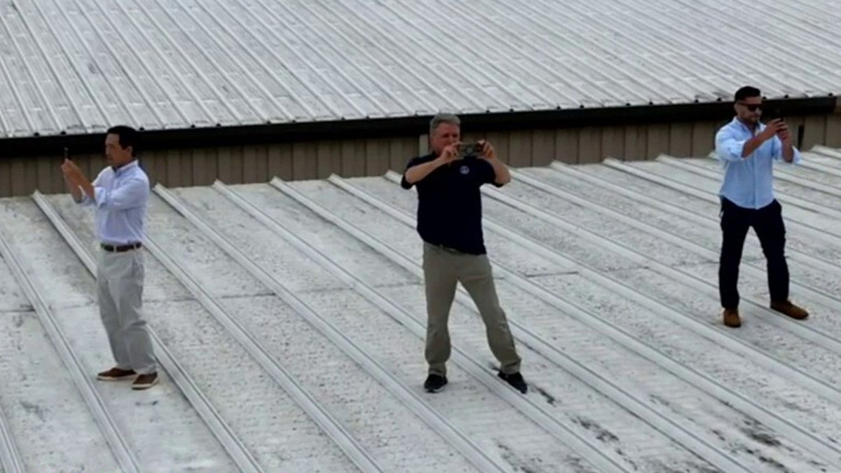 lawmakers on roof in Butler, Pa.