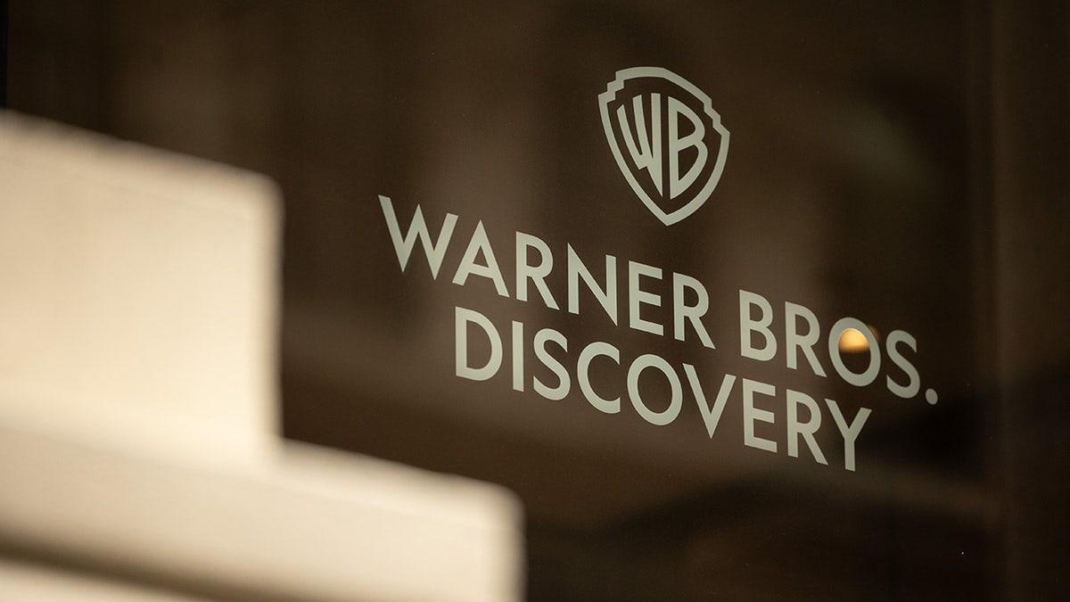 Warner Bros Discovery signage at an office
