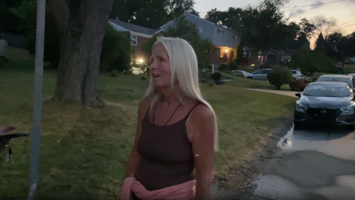 Amy spoke to reporters outside Crooks' home.