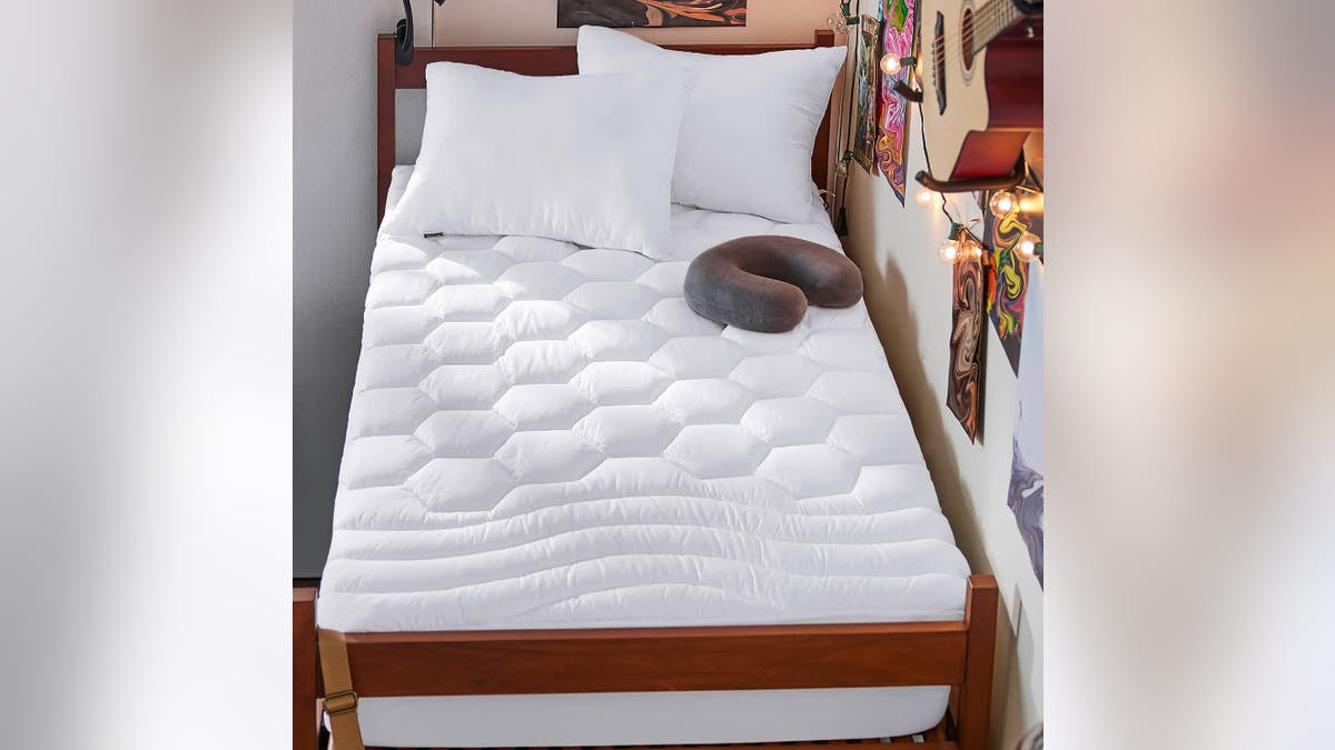 Transform a dorm mattress into something comfortable with this topper.