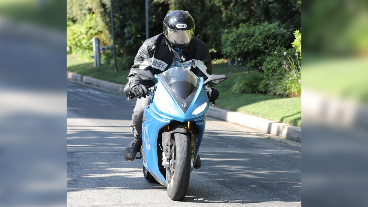 Actor Ben Affleck wore a helmet on his motorcycle.