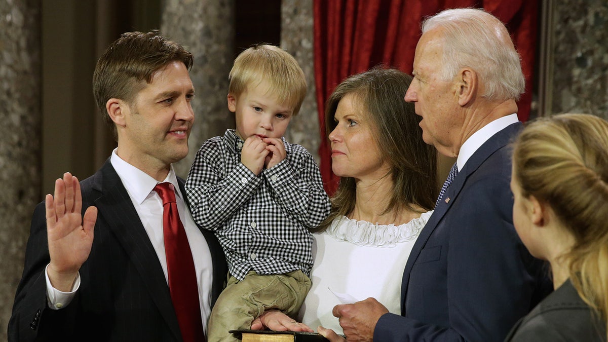 Ben Sasse and his wife as he's sworn in to the senate