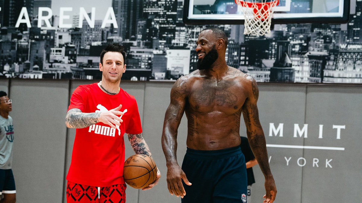 Chris Brickley and LeBron James on the court