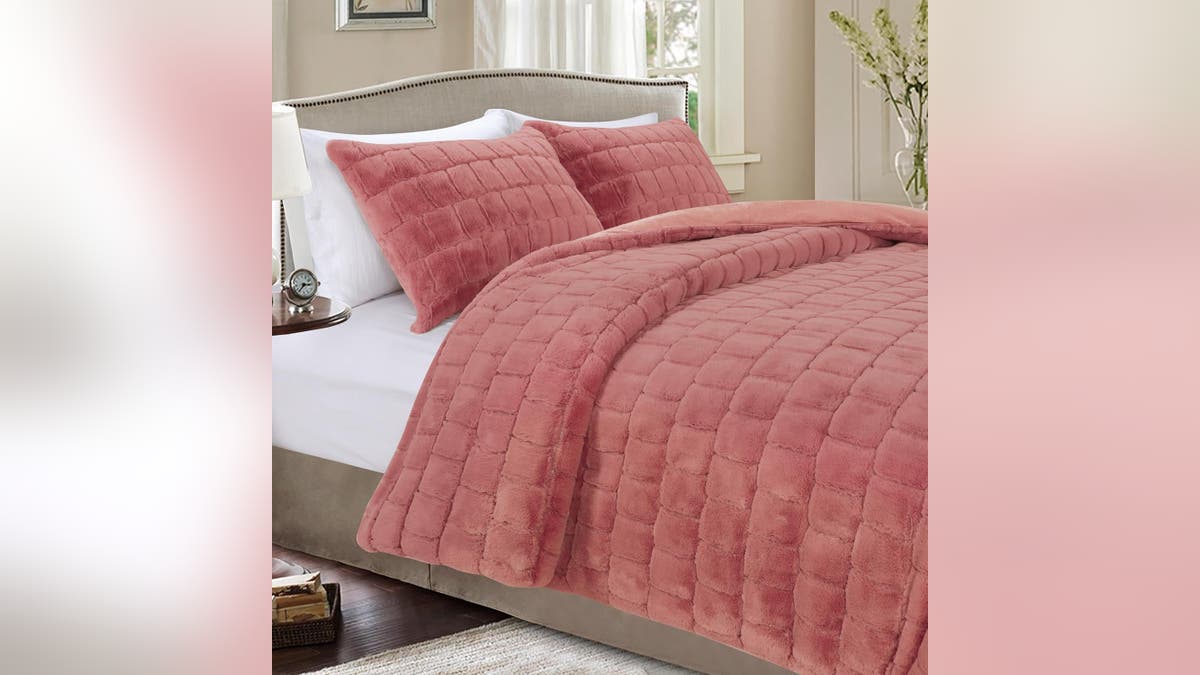 Add some color to your bedroom decor with this comforter. 
