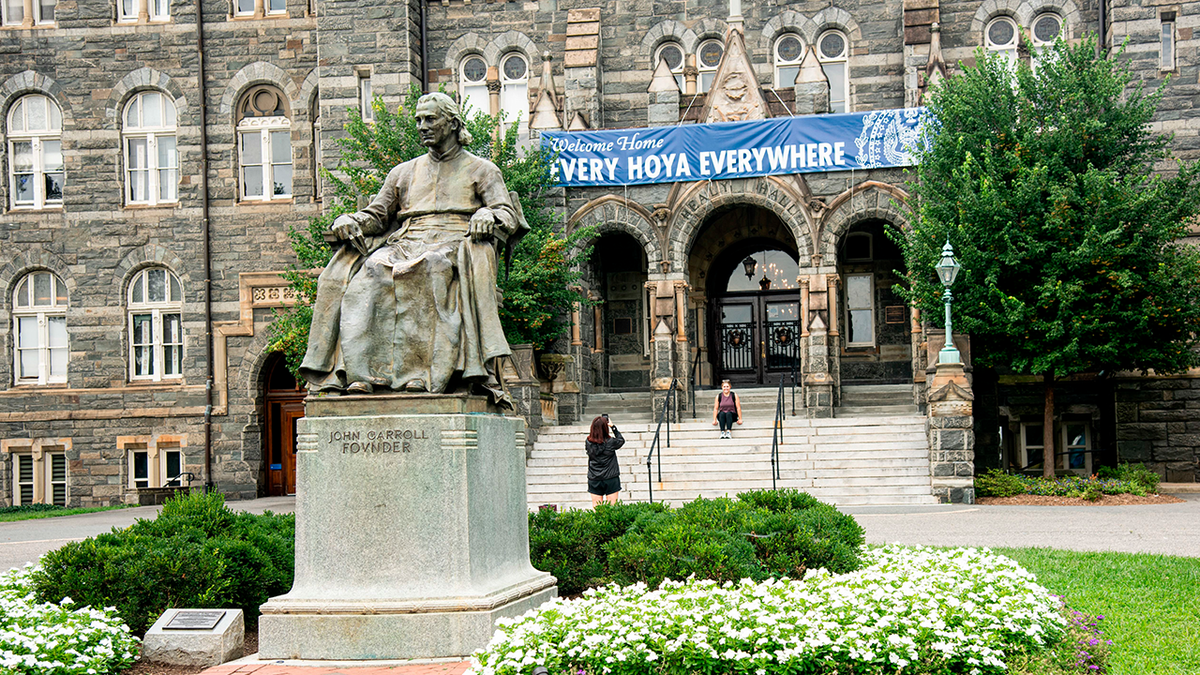 Statue of John Carroll, founder of the school, on the campus of Georgetown University, Washington, DC. (Photo by: Robert Knopes/UCG/Universal Images Group via Getty Images)