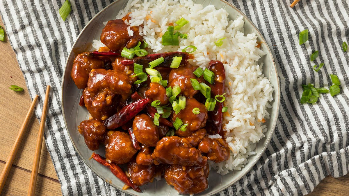 Homemade Chinese General Tsos Chicken with White Rice.