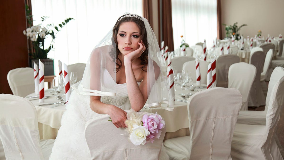 bride looking sad at a wedding.