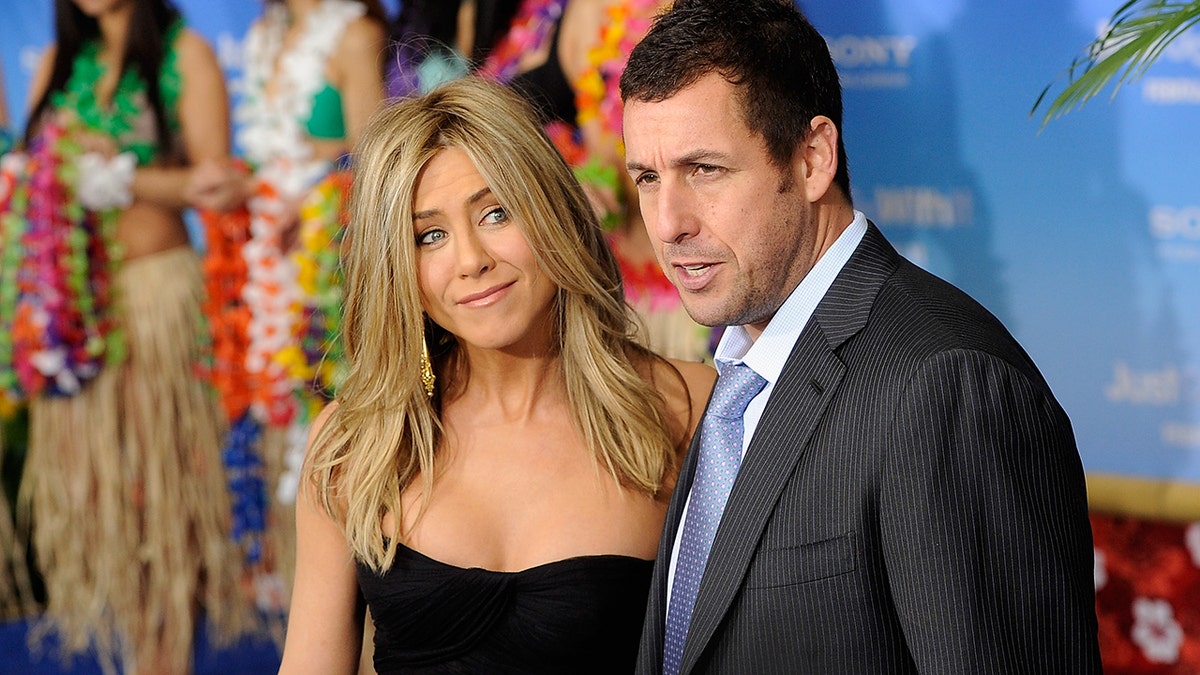 Jennifer Aniston and Adam Sandler at "Just Go With It" premiere