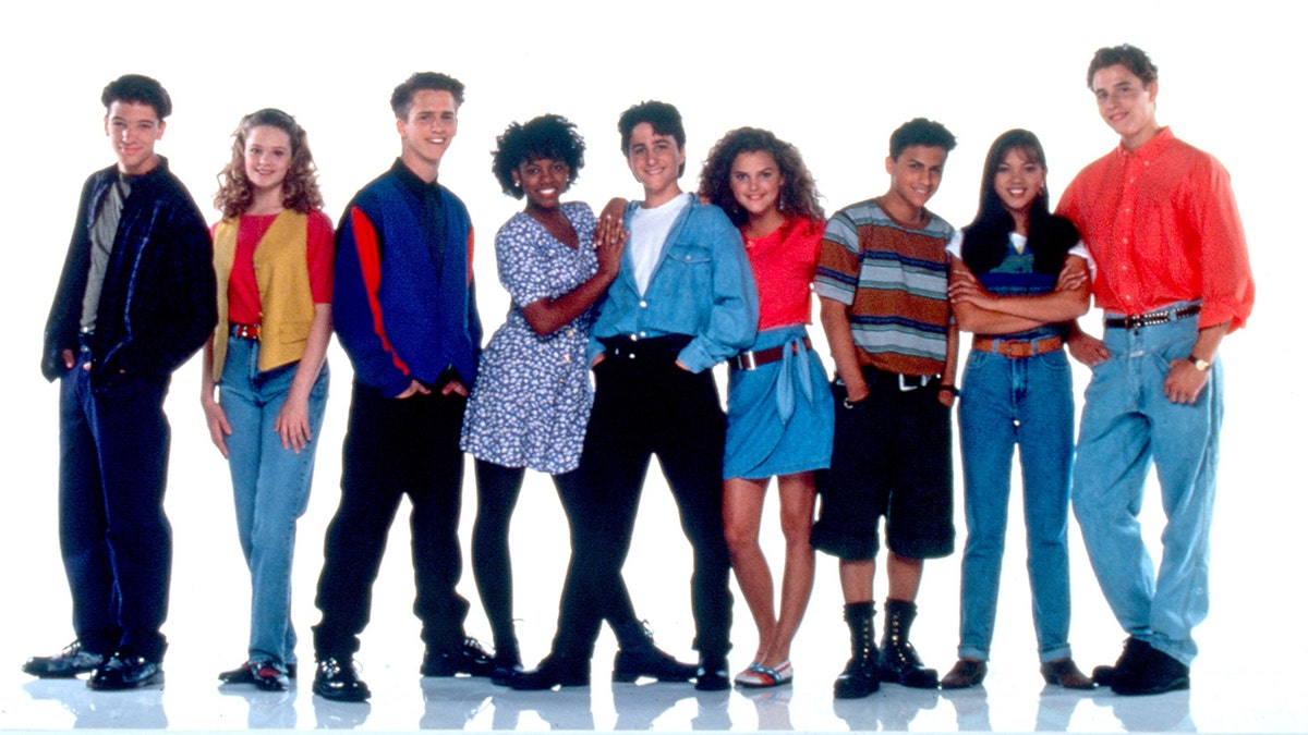 J.C. Chasez from NSYNC on the left and Keri Russell 6th from the left in a picture with the cast of "The All New Mickey Mouse Club"