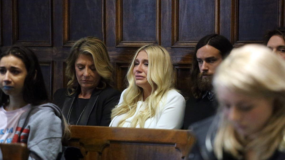 A photo of Kesha in court