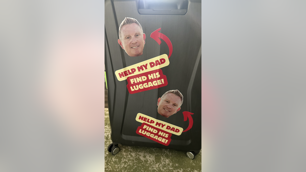 Luggage with face stickers