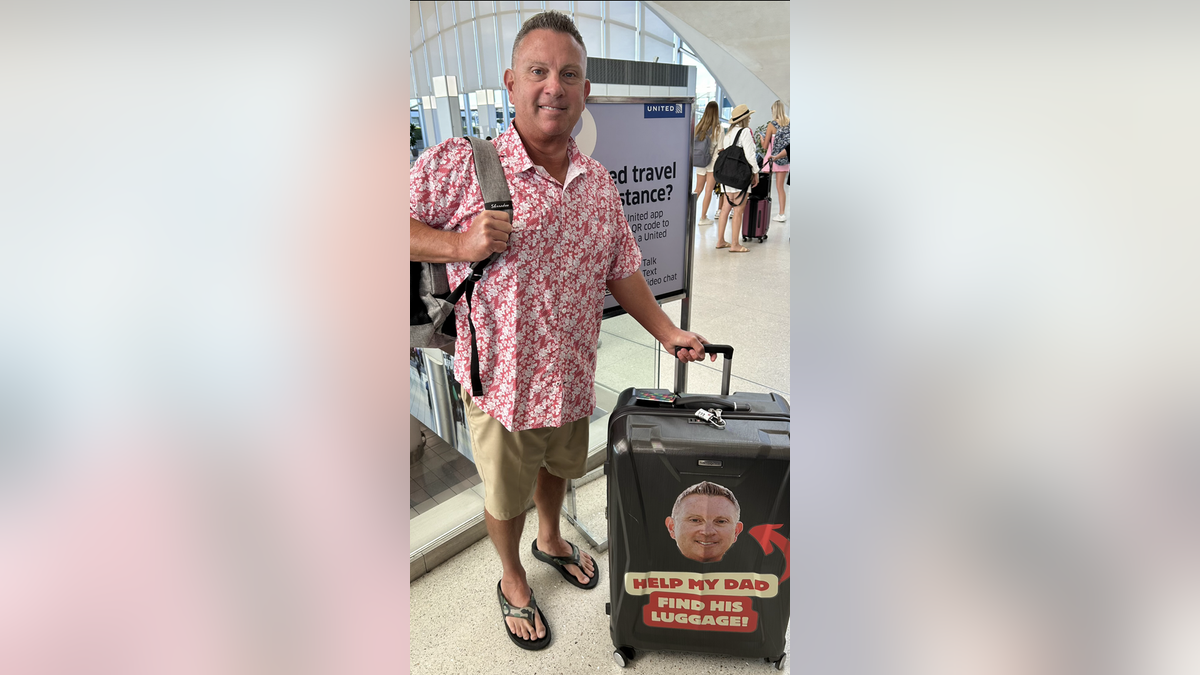 Mike Bone with luggage