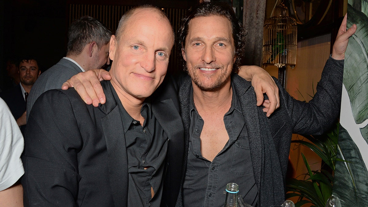 Woody Harrelson and Matthew McConaughey at launch party of a new bar.