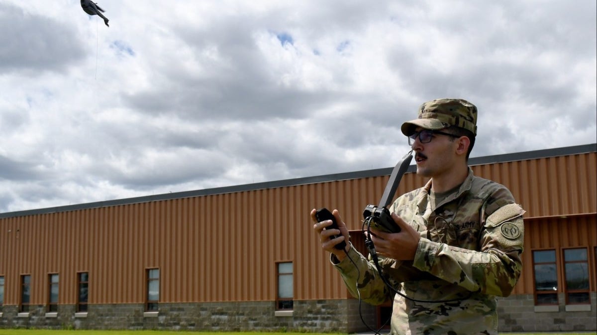 Army soldiers tests mini drone
