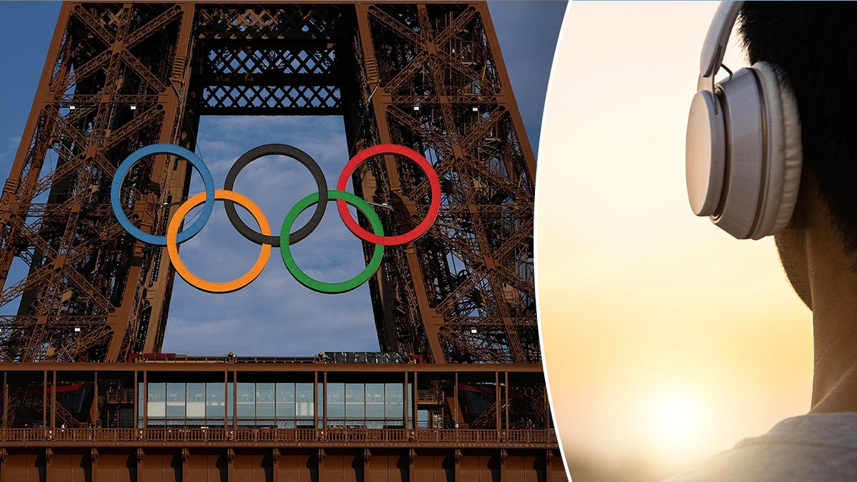 Olympic rings on Eiffel Tower next to person wearing headphones