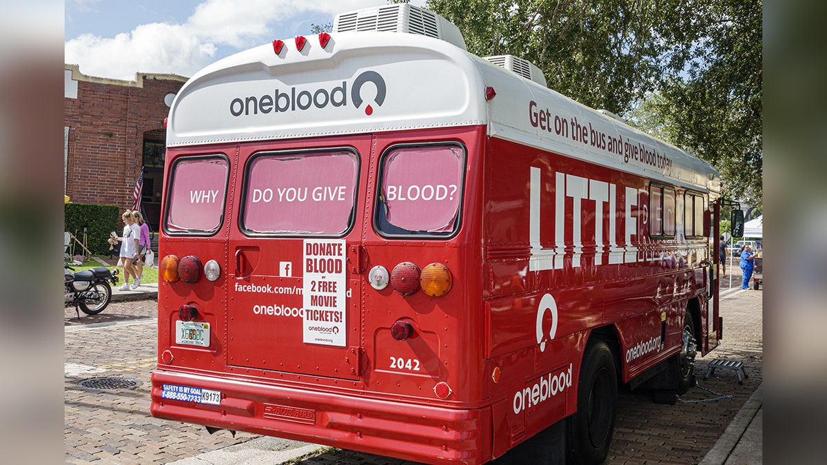 A back side view of the OneBlood donation bus