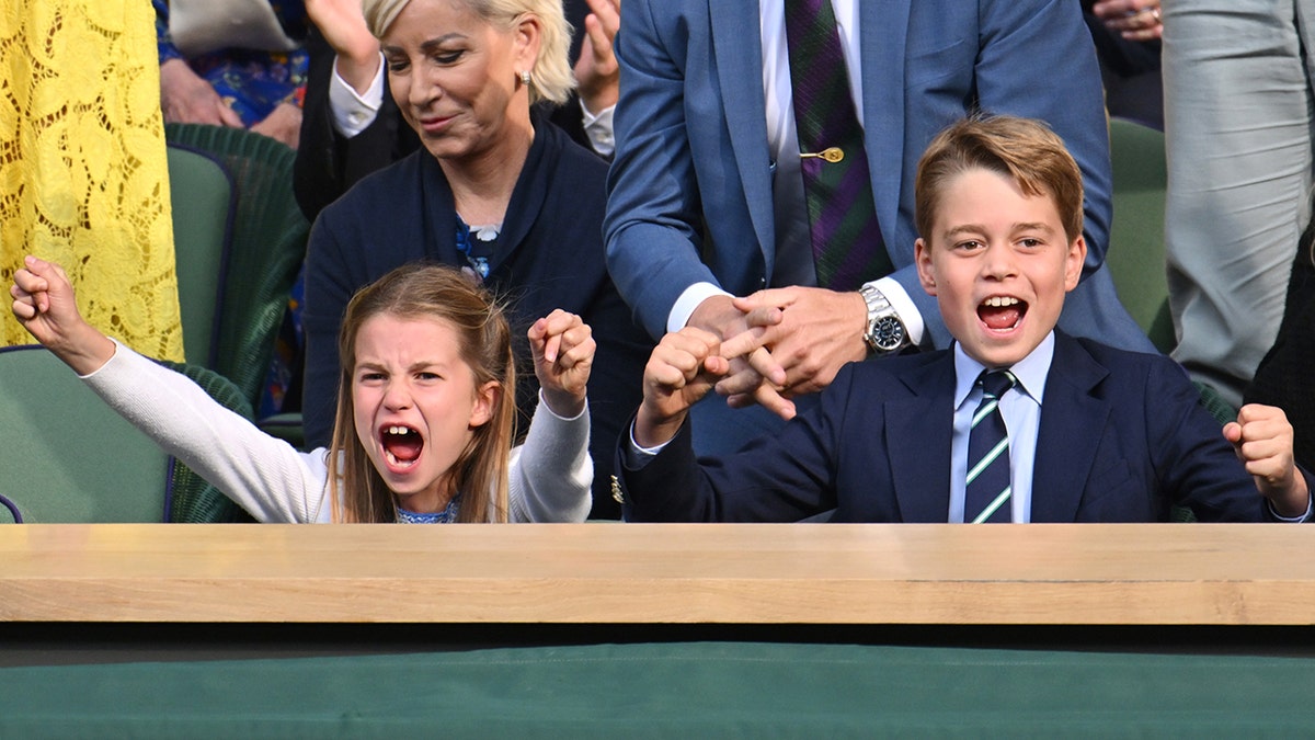 Prince George and Prince Charlotte cheering during Carlos Alcaraz vs Novak Djokovic in the Wimbledon 2023 men's final.
