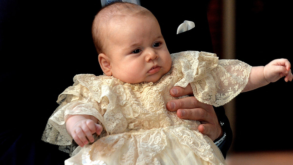 Prince George as a baby in his christening dress