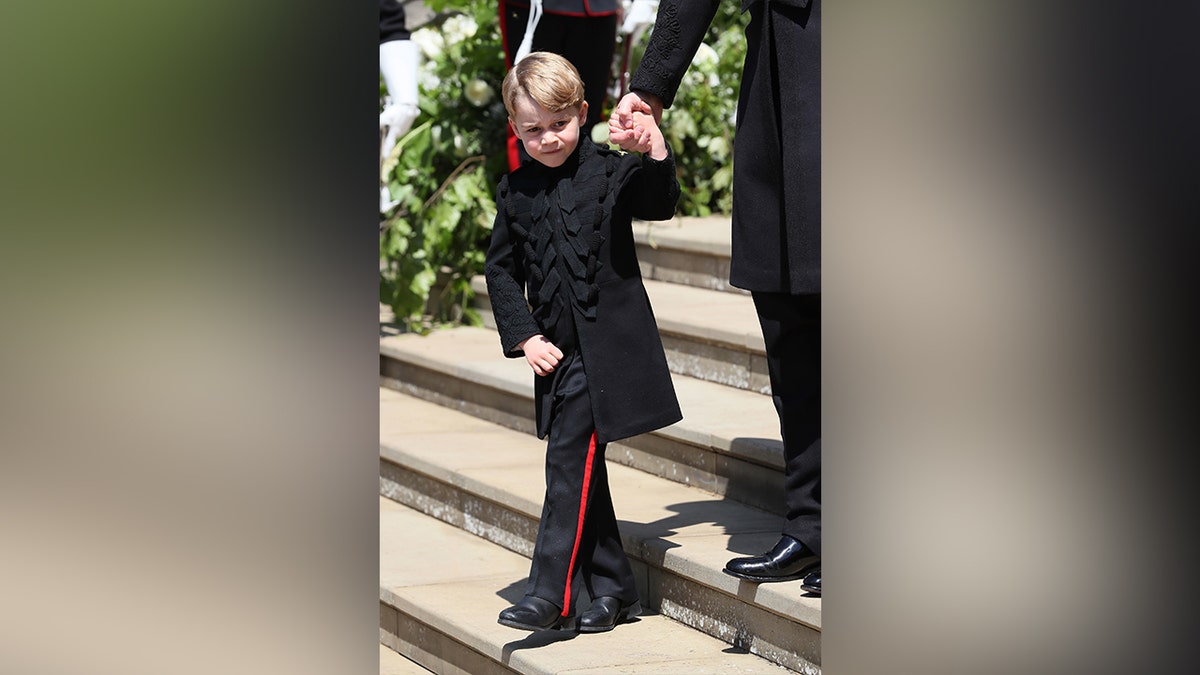 Prince George in black at Prince Harry's wedding.