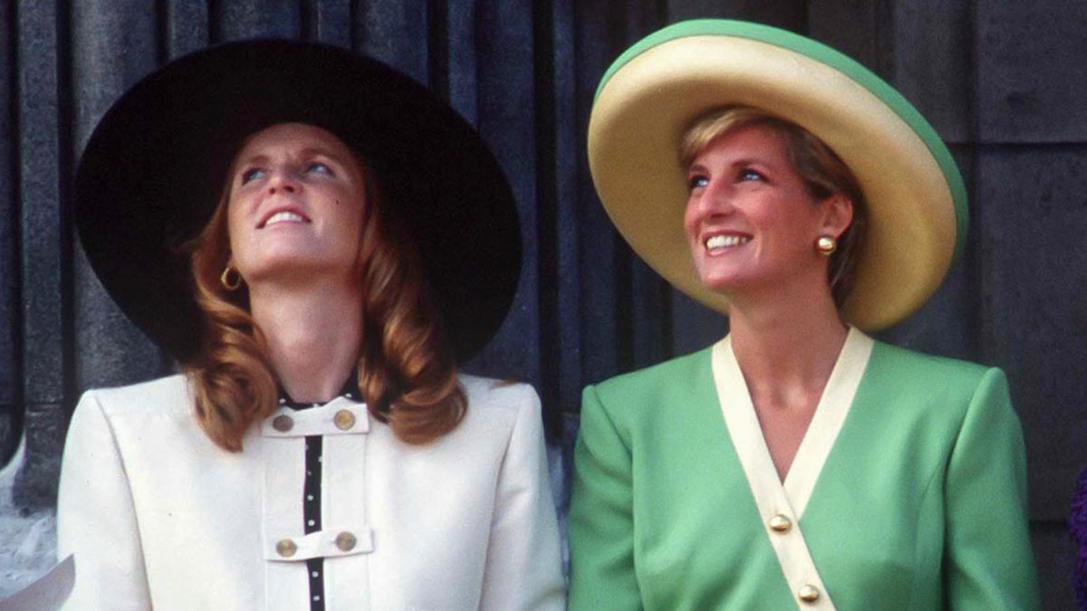 Princess Diana and Sarah Ferguson on the balcony at Buckingham Palace.