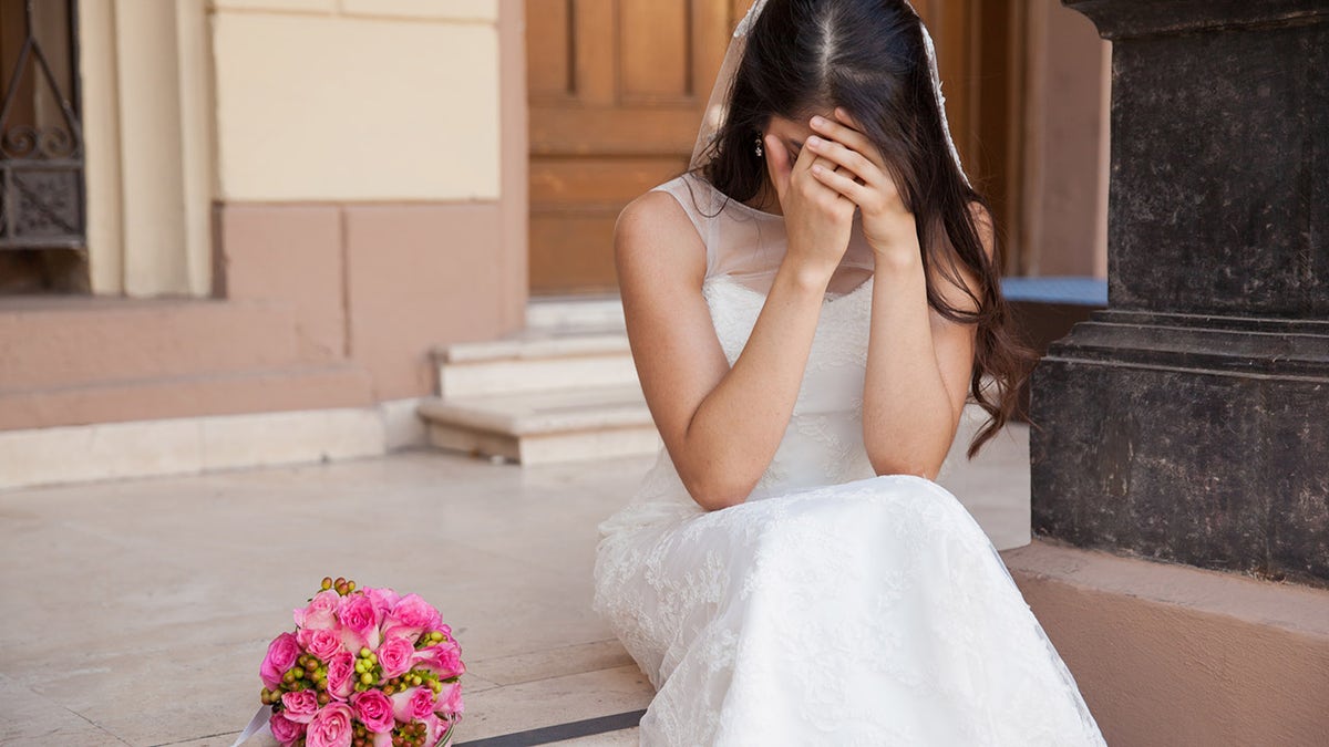 Sad bride on wedding day