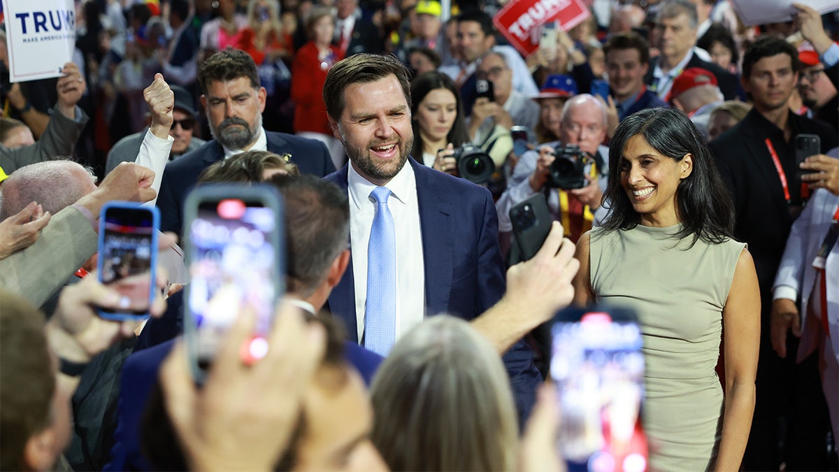 Trump's pick for Vice President, U.S. Sen. J.D. Vance (R-OH) and his wife Usha Chilukuri Vance arrive on the first day of the Republican National Convention at the Fiserv Forum on July 15, 2024 in Milwaukee.