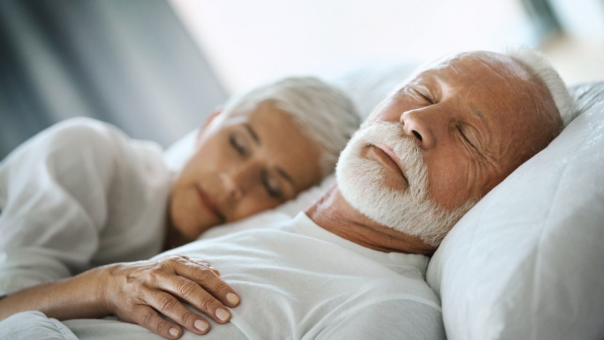 Senior couple sleeping