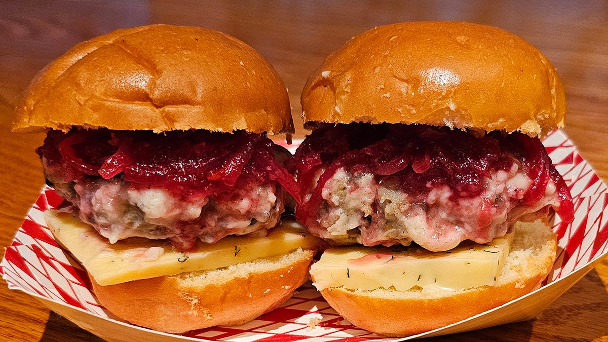 Slider burger with lingonberry jam and a wild-rice meatball.