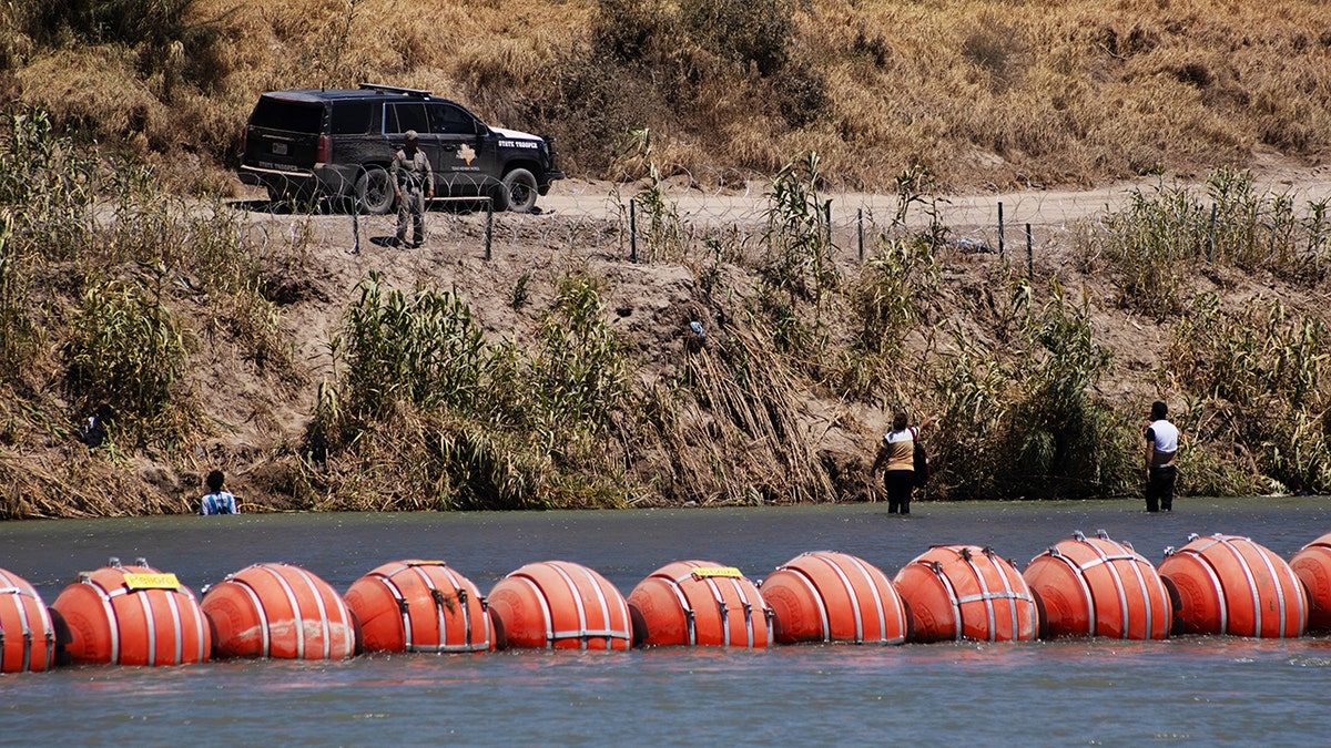 barrier with floating buoys