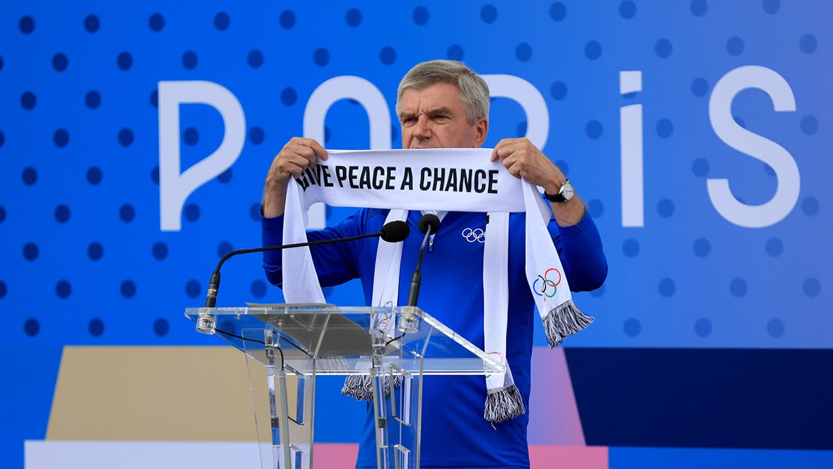 IOC President Thomas Bach podium