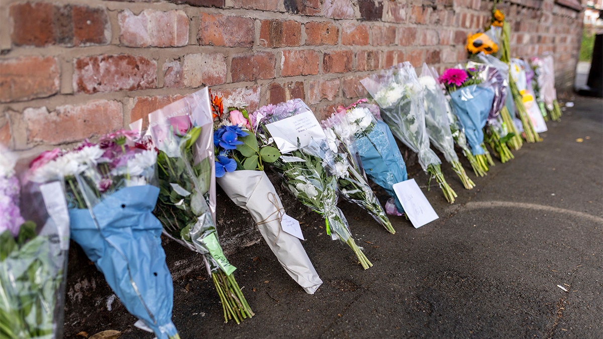 Flowers were left for the victims of the dance class stabbing attack