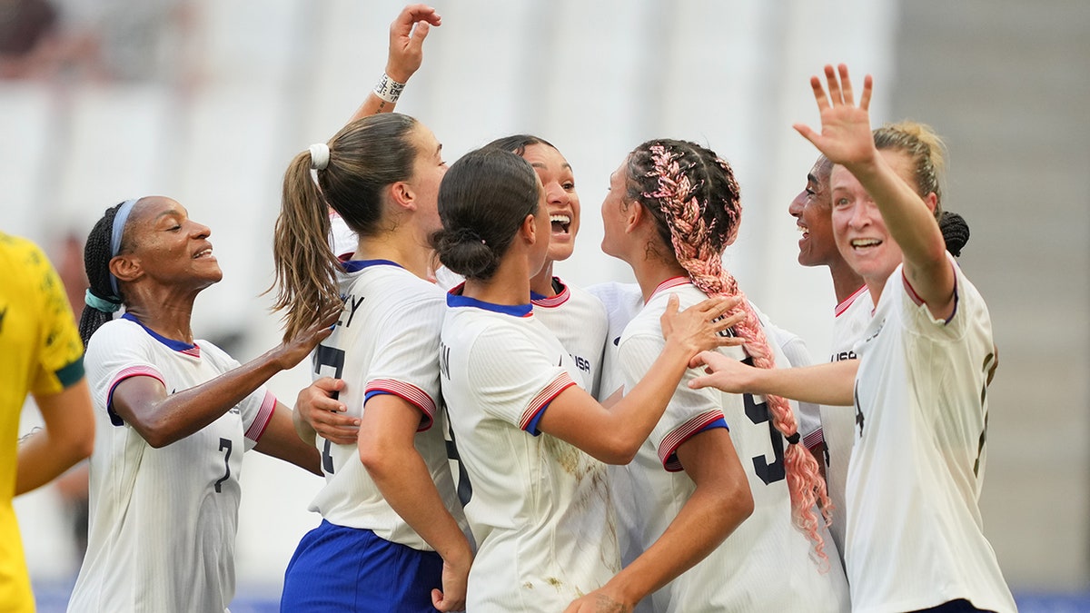 The football team celebrates