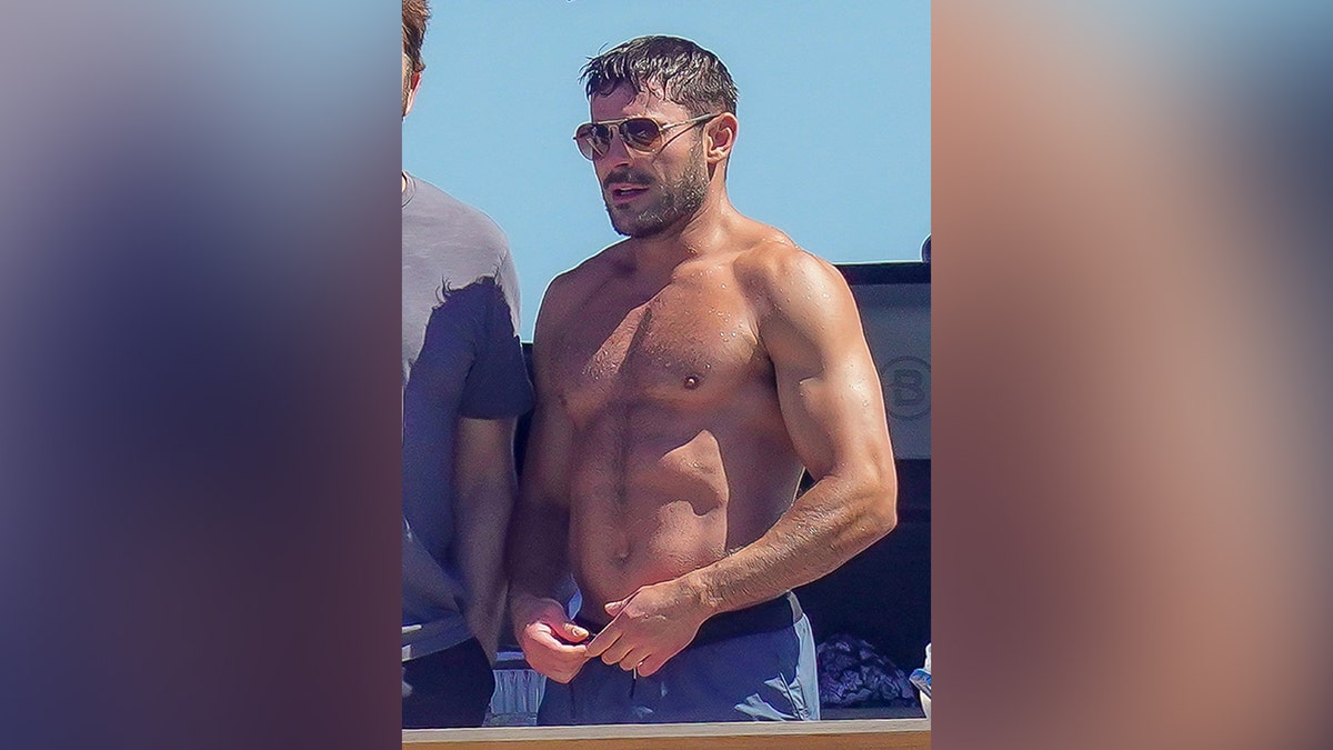 Zac Efron shirtless while on a boat in St. Tropez