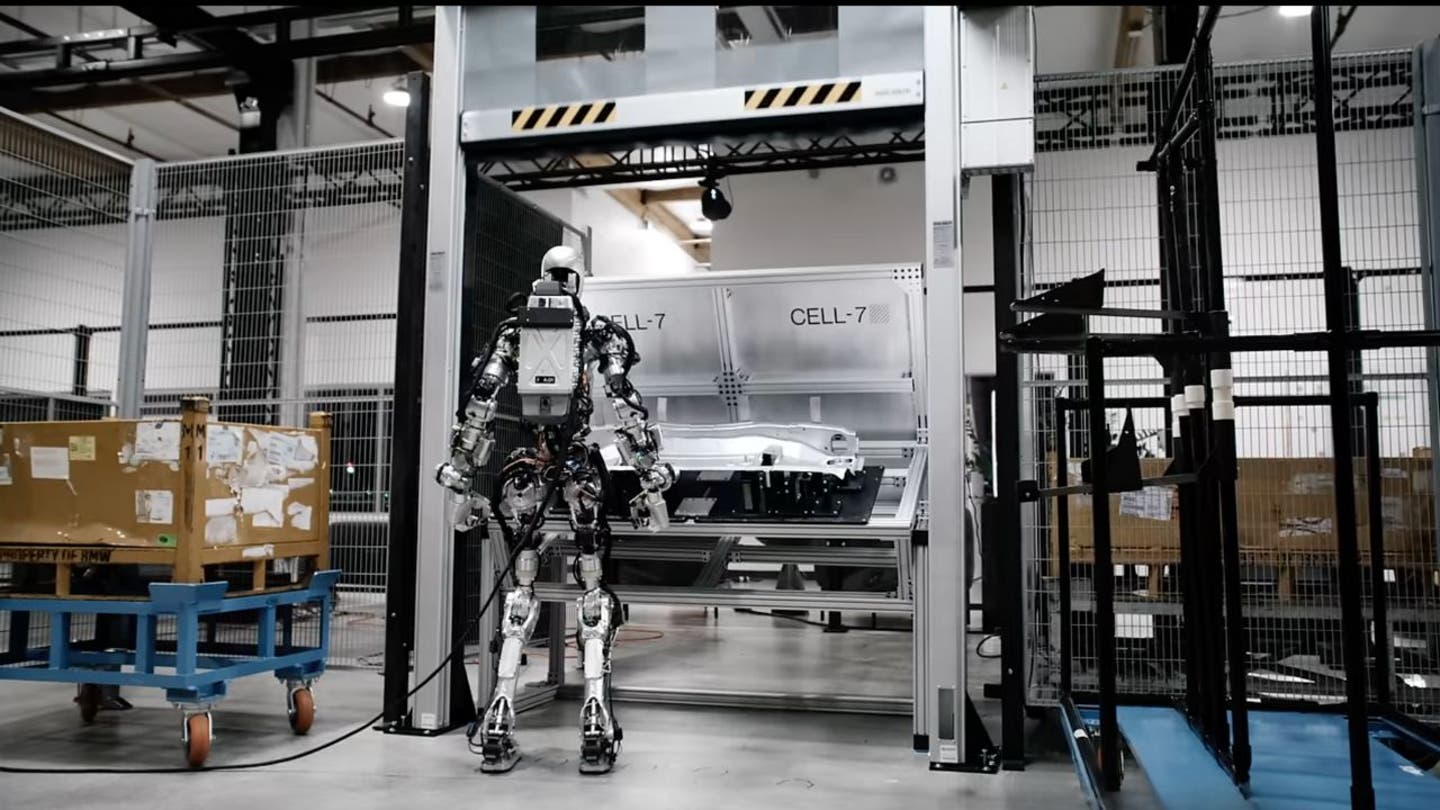 1 Humanoid robot gets to work in BMW assembly plant