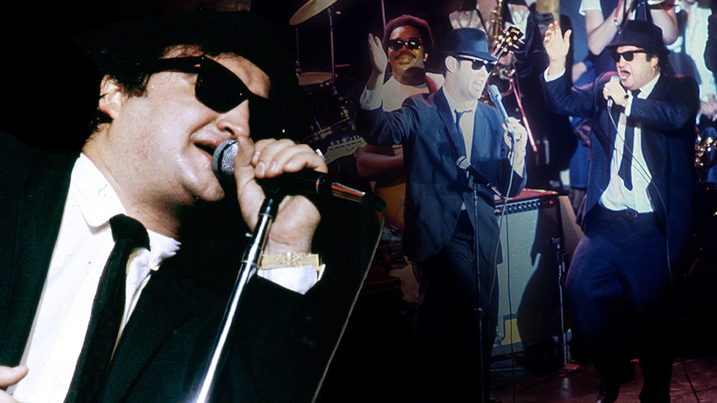 John Belushi Defends Blues Brothers Amidst Cultural Criticism