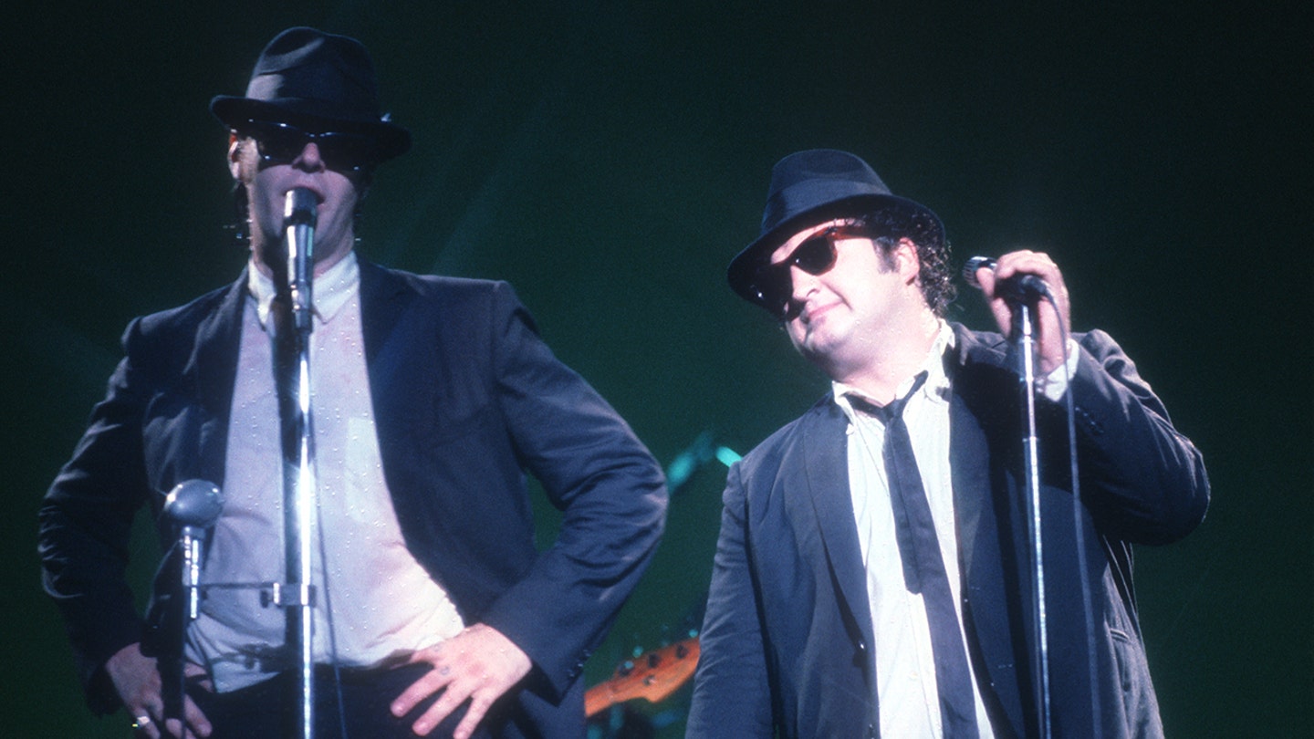 John Belushi Defends Blues Brothers Amidst Cultural Criticism