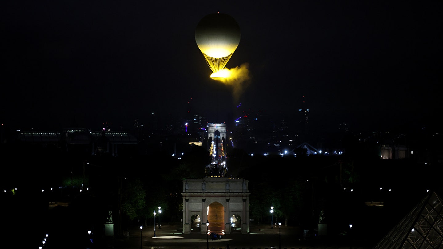 Lighting the Olympic Flame: French Legends Pérec and Riner Ignite Paris 2024