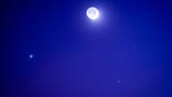 Devil comet, officially the 12P/Pons-Brooks Comet Next To Jupiter And The Moon