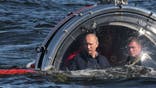 BALTIC SEA - JULY 15: Russian President Vladimir Putin rides in a submersible July 15, 2013 in the Baltic Sea near Gotland Island, Russia. The vessel dove to the sea floor to explore a sunken ship in the Gulf of Finland. (Photo by Sasha Mordovets/Getty Images)