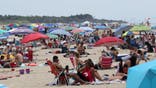 Beachgoers at a beach on the Jersey Shore