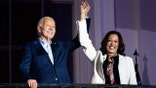 US President Joe Biden, left, and Vice President Kamala Harris on the Truman Balcony of the White House in Washington, DC, US, on Thursday, July 4, 2024. Bidens reelection campaign limped into the US Independence Day holiday, exhausted by a week of the incumbent clawing to maintain his hold on his partys nomination. Photographer: Tierney L. Cross/Bloomberg via Getty Images
